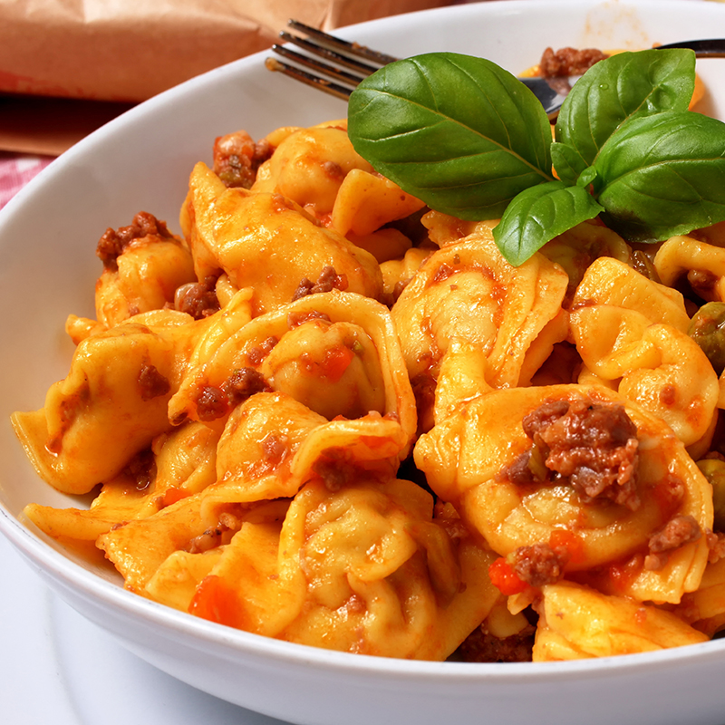 Cappelletti filled pasta with homemade meat sauce - Vittoria Caterina ...